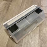 Die Absaugklappen am Staubbehälter