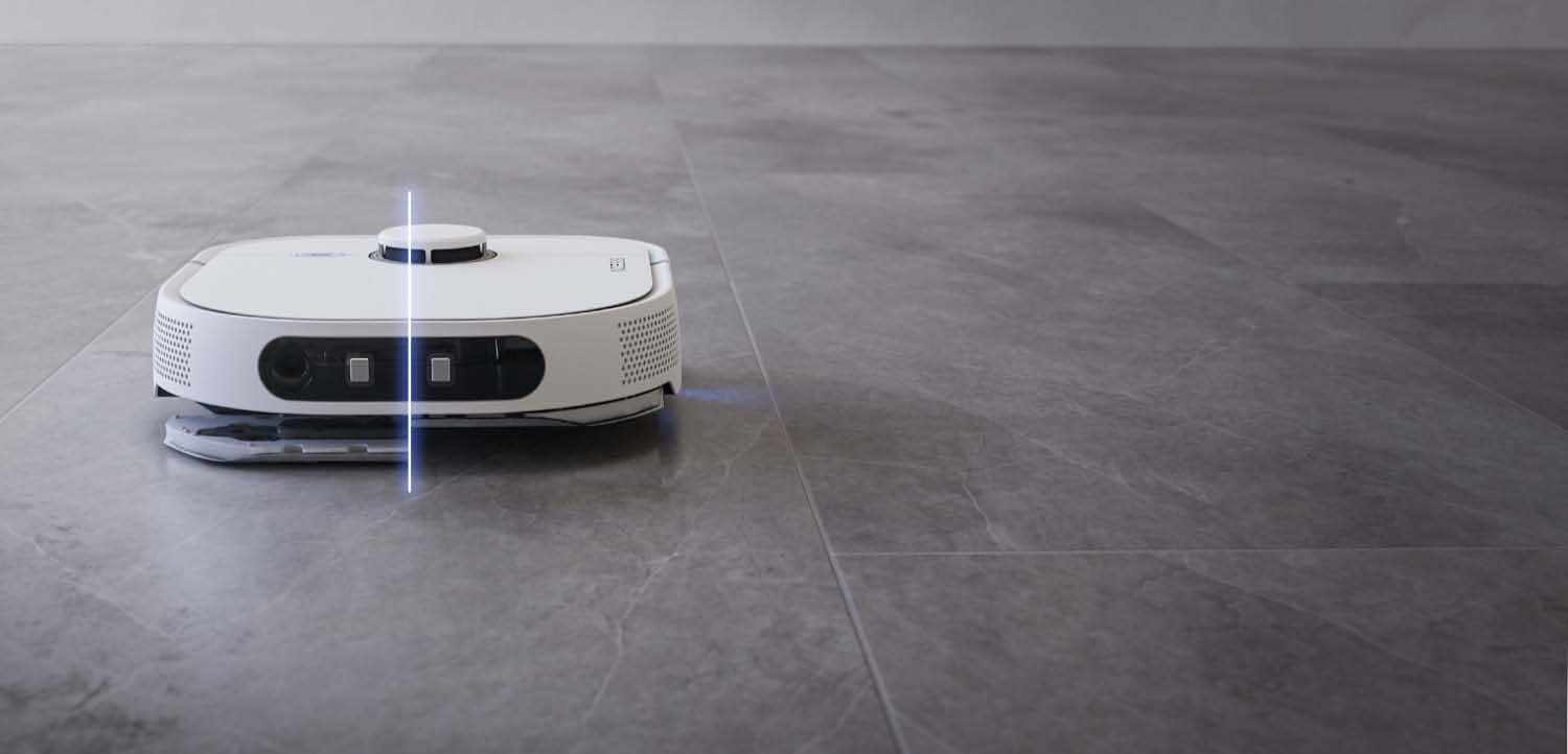 NOESIS Florio - Er hebt sein Wischpad über Teppichboden an